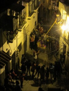 Breaking the pinata, Las Posadas, Taxco, Mexico