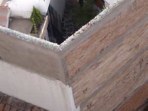 Wall with broken glass on top, Taxco, Mexico