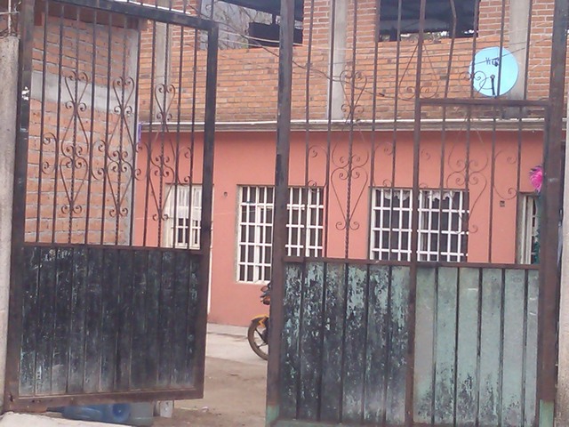 Gated to courtyard of house, Ocotito, Mexico