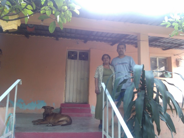 Family on front porch, El Ocotito, Mexico