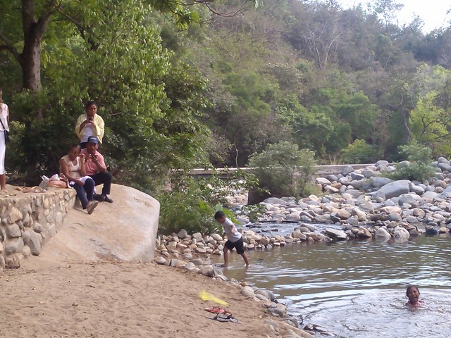 Playing in the river at the base of Tehaucalco, Mexico