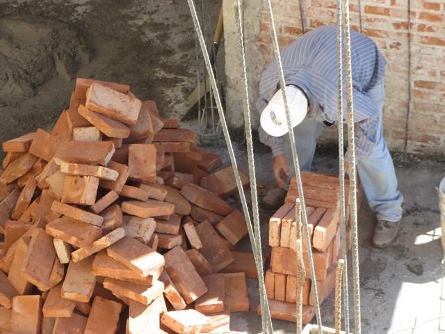Stacking bricks, Hotel de Mineral de Taxco, rear view, Taxco de Alarcon, Mexico